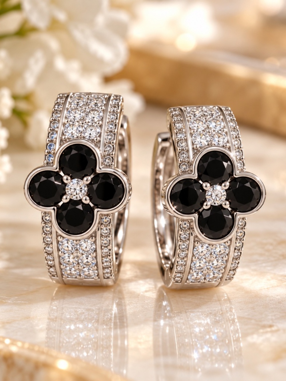 White gold Huggies with black onyx clover and pave' setting